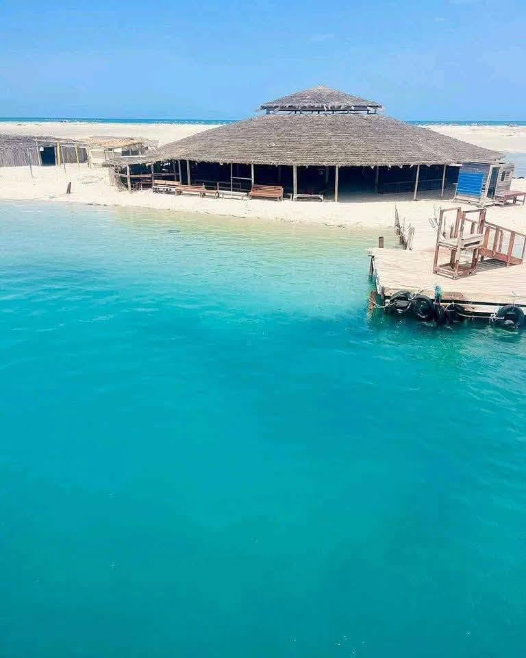 Ras Rmal (Flamingo Island): the sandspit you reach by boat